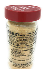 Jar closeup of Morton and Bassett Organic Garlic Powder showing fine texture and aroma for cooking