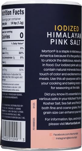 Morton pink salt dusting over dish to finish flavor