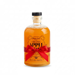 Mother Earth Vinegar bottle with pour spout for easy dressing and seasoning.