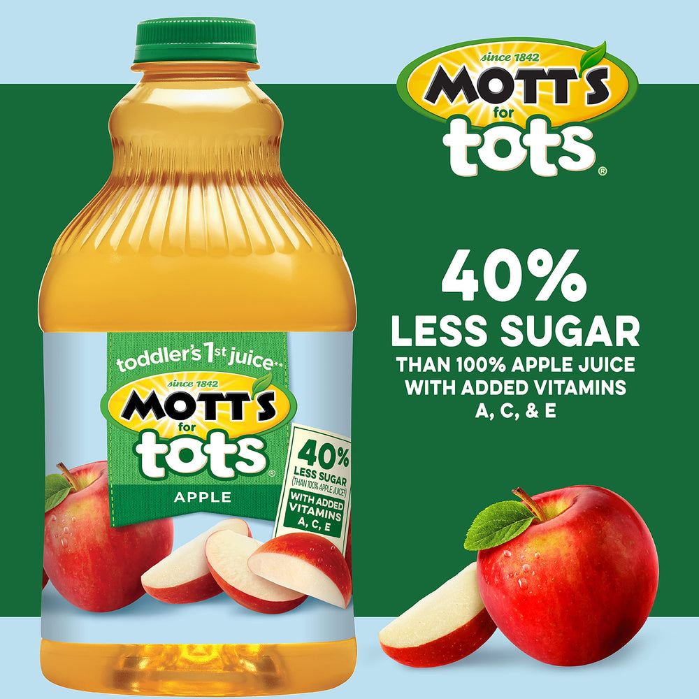 Happy toddler drinking Mott's For Tots during a snack time