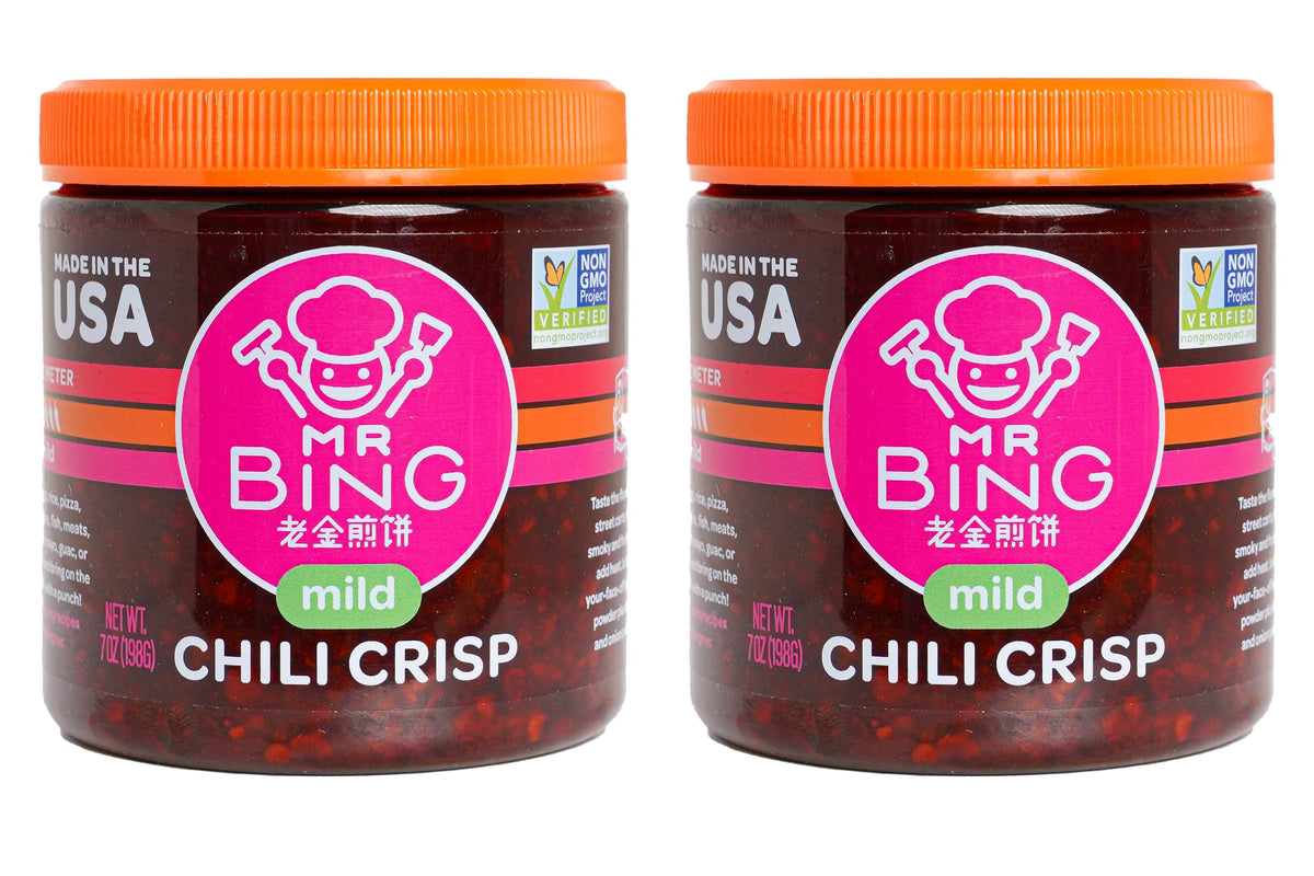 MR BING Chili Crisp jar front with glossy oil and crunch, ideal for elevating meals.