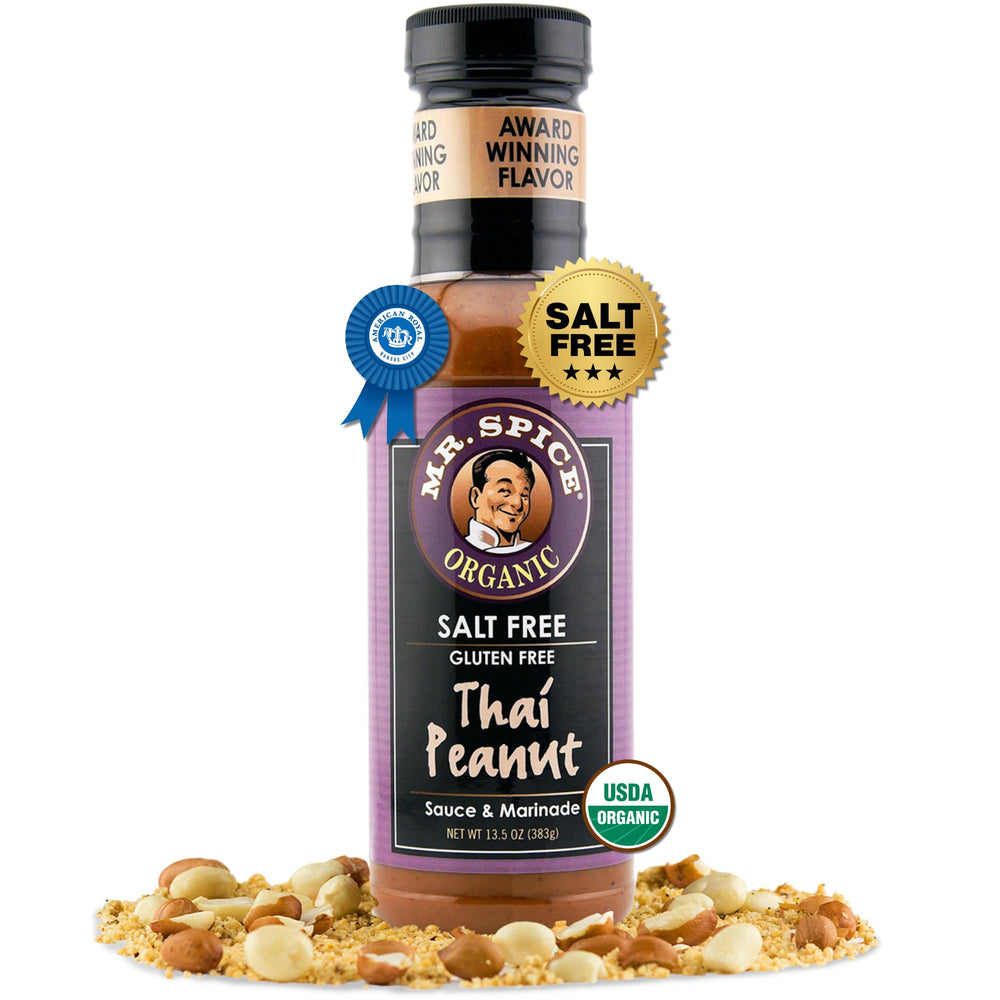 Mr. Spice Organic Thai Peanut Sauce being poured for a low-sodium dinner option.