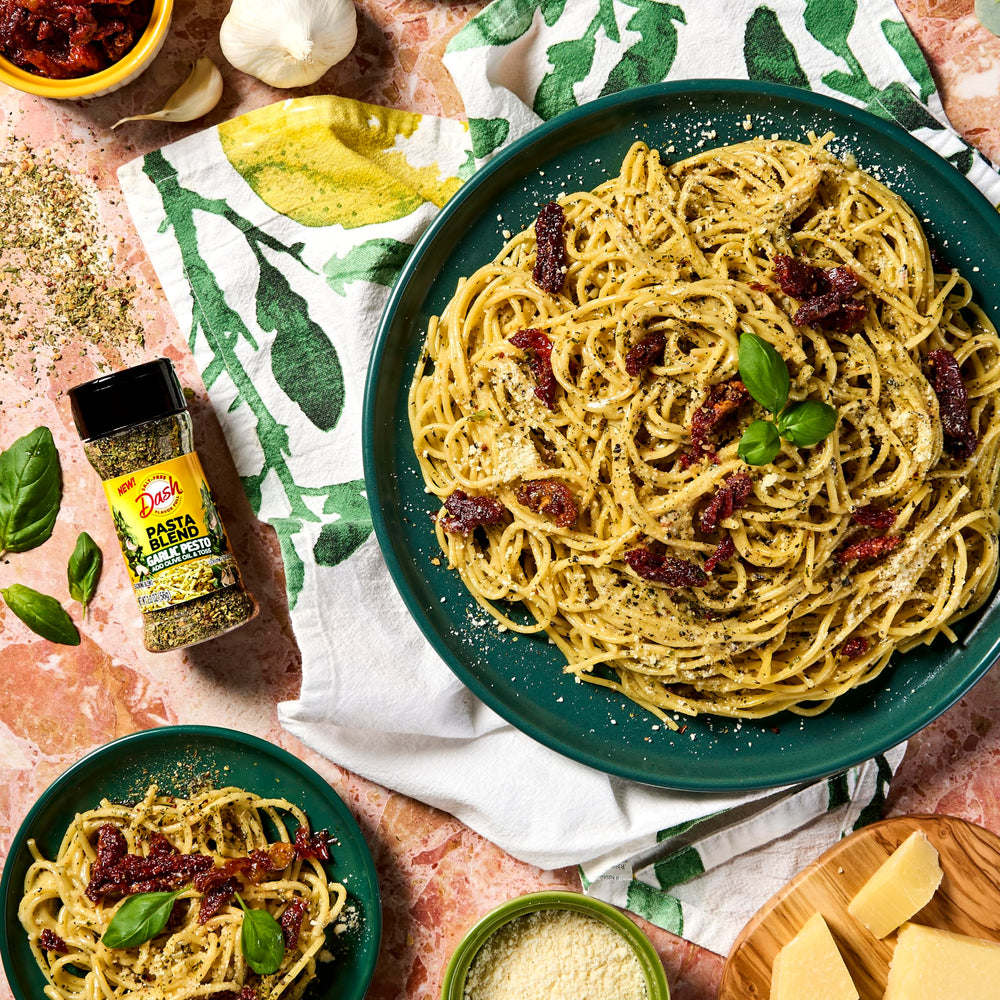 Mrs Dash Garlic Onion Flakes blend sprinkles over pasta for a quick flavor boost.