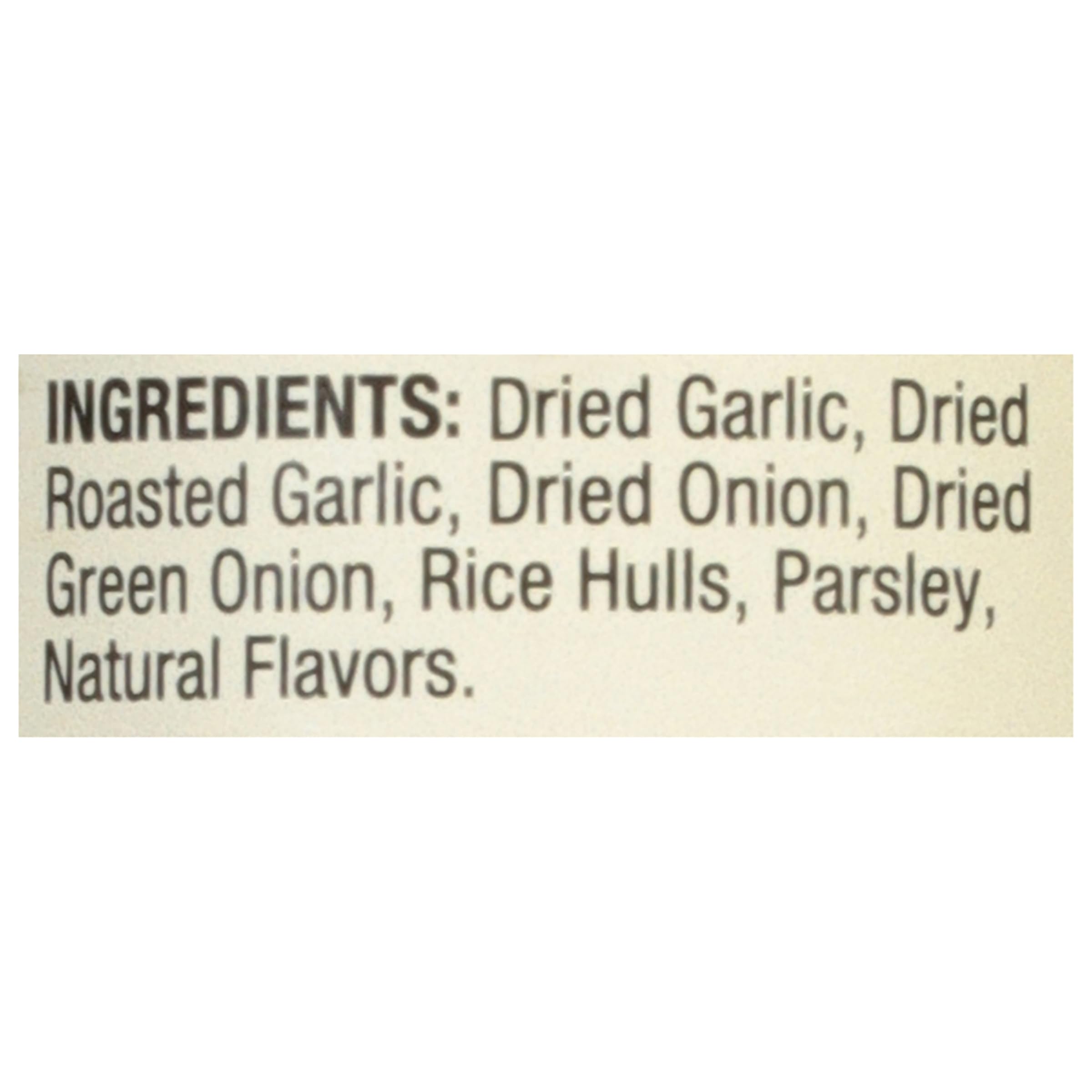 Mrs. Dash garlic blend close-up with green onion and parsley brightens sauces and sides.