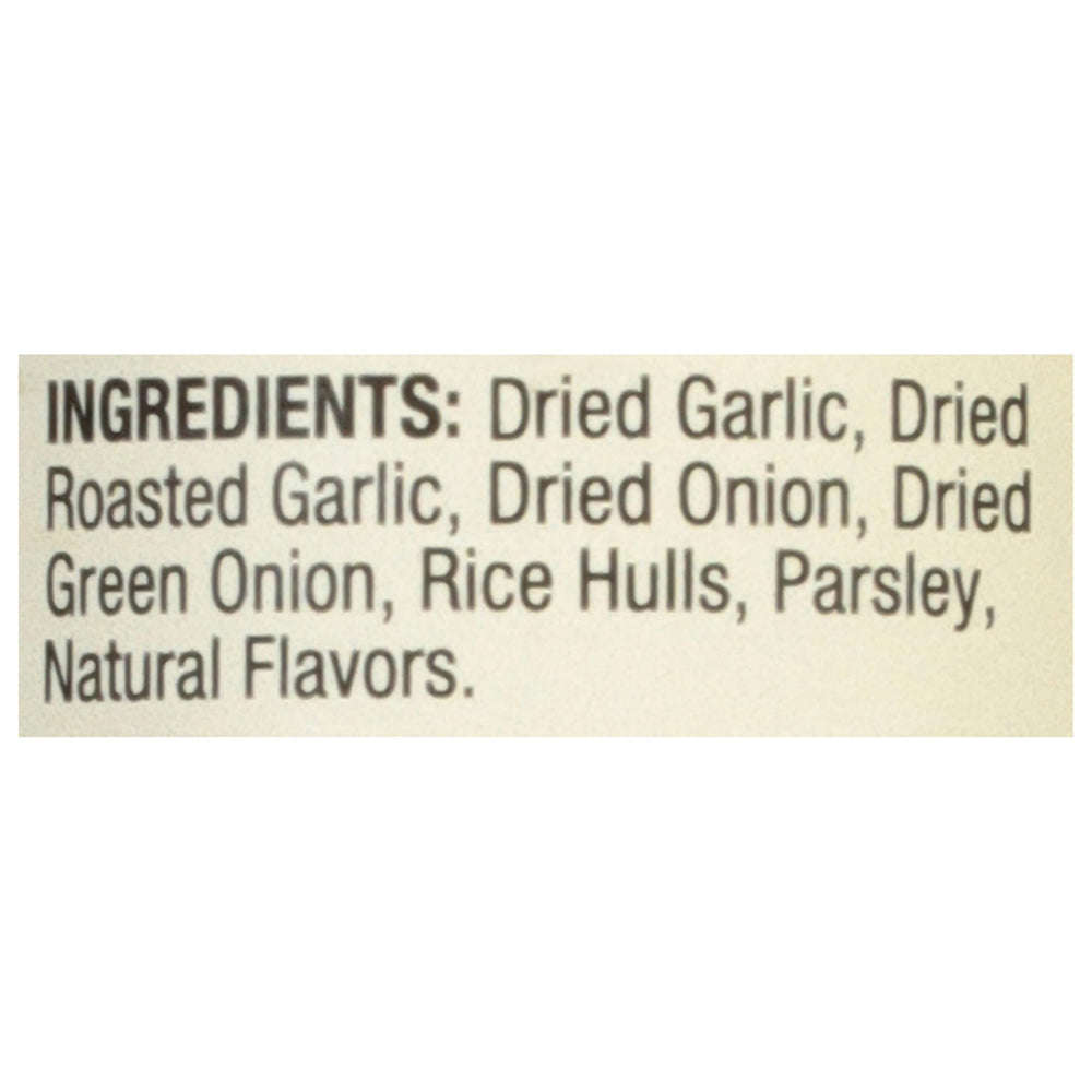Mrs. Dash garlic blend close-up with green onion and parsley brightens sauces and sides.