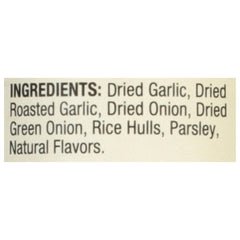 Mrs. Dash garlic blend close-up with green onion and parsley brightens sauces and sides.