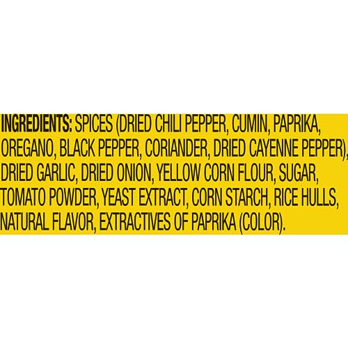 Pouring Mrs. Dash salt-free taco seasoning onto food