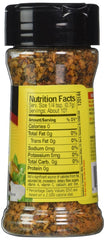 Pouring Mrs. Dash Steak Grilling Blend over steak for grilled flavor.