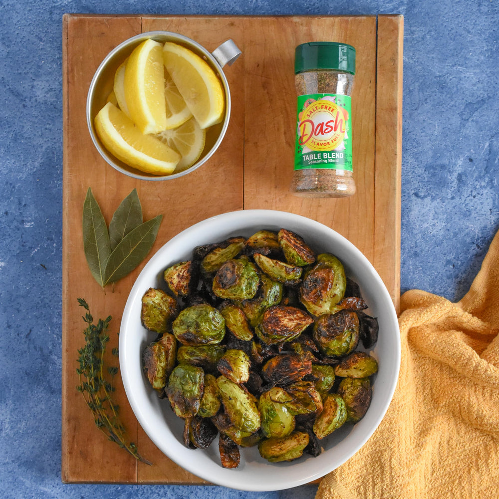 Mrs. Dash table blend on eggs, delivering tasty, salt-free breakfasts.