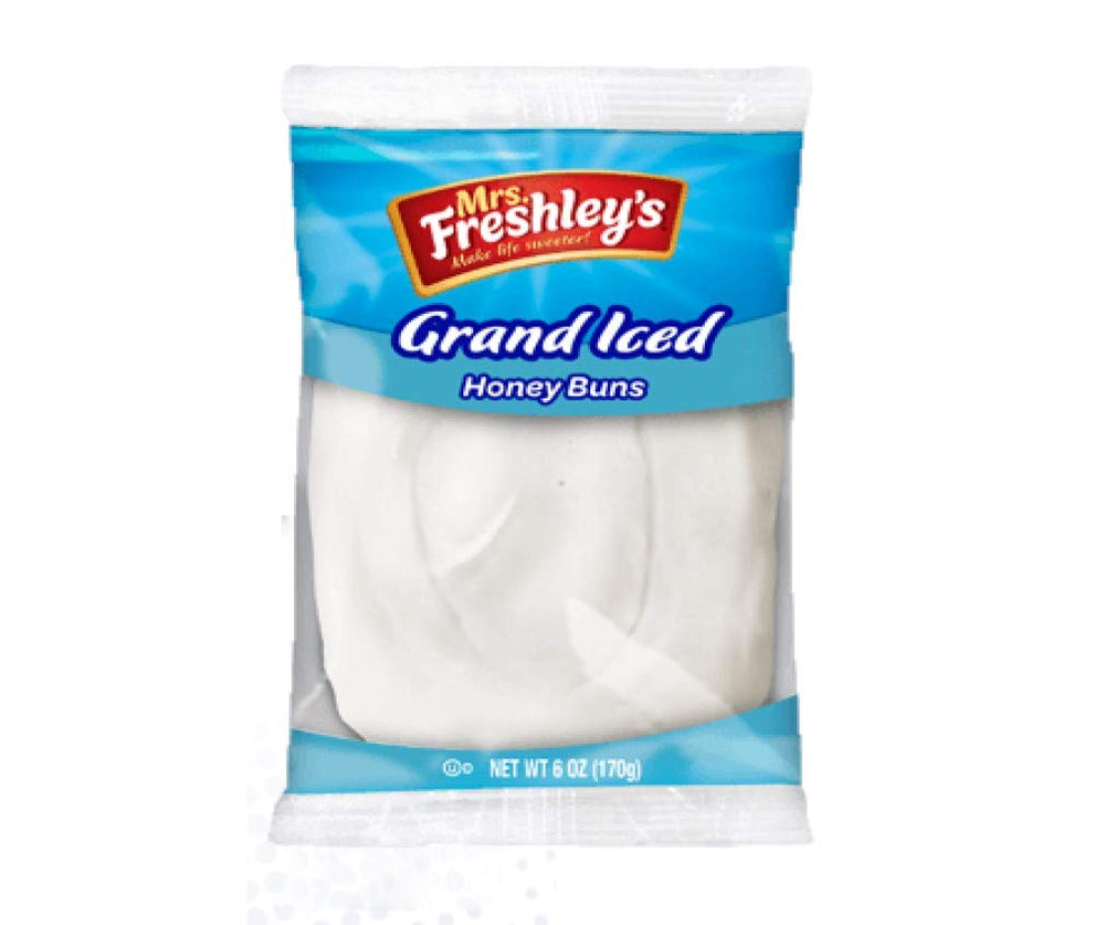Mrs. Freshley's Grand White Iced Honey Bun pairs with coffee for a comforting snack.