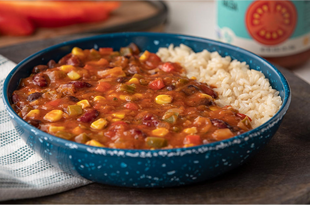 Salsa served with chips in a bowl for a vibrant party dip.