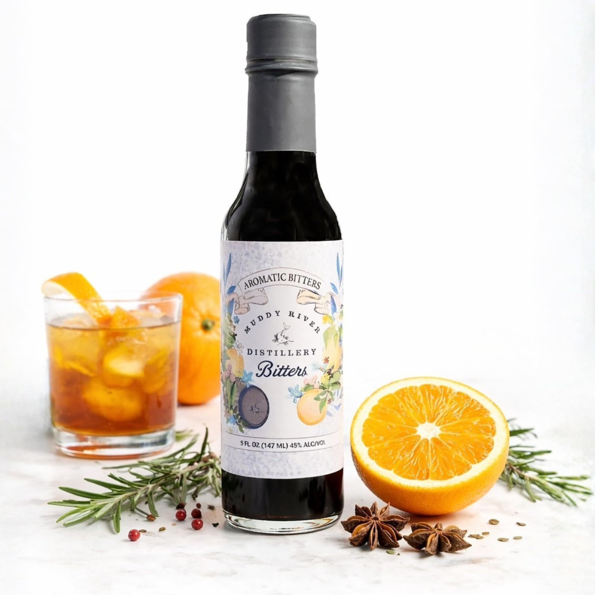 Muddy River Aromatic Bitters bottle label; handcrafted small-batch flavor.