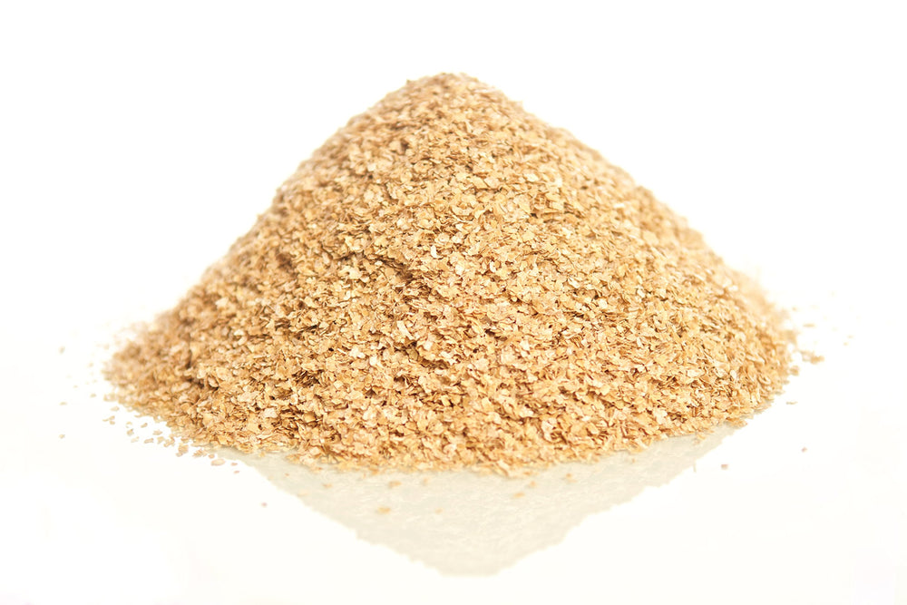 Close-up of textured wheat bran showing natural color variation.