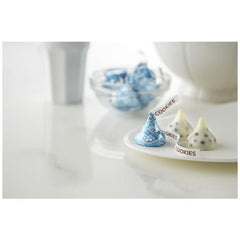 Munchique Cookies and Cream Kisses on a dessert table ready to share.