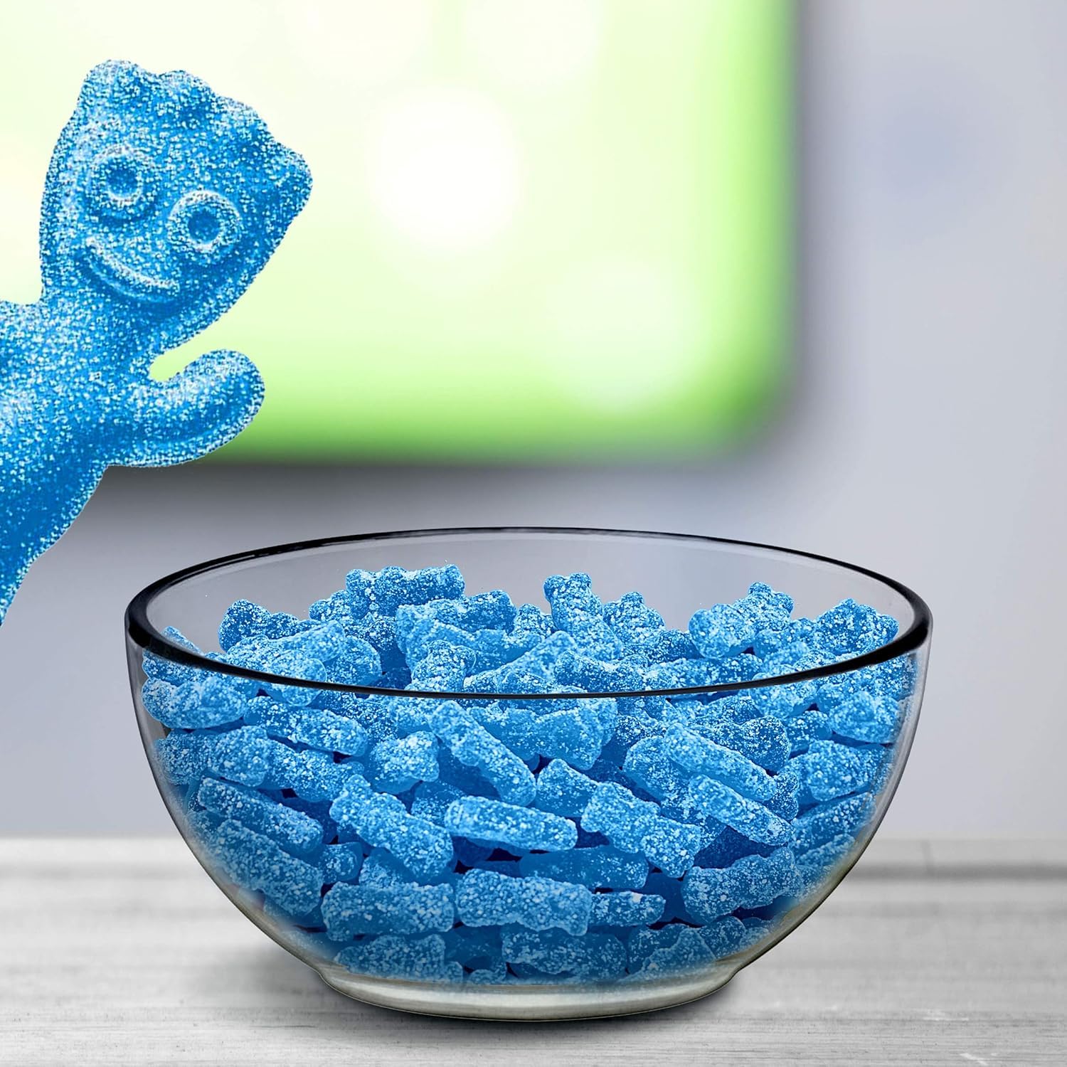 Munchique Halloween candy bowl with blue gummies.