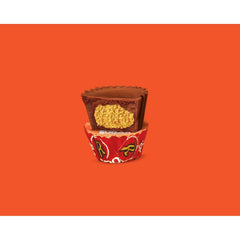 Munchique silky milk chocolate coating over peanut butter center.