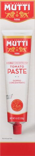 Mutti tomato paste tube on kitchen counter; convenient pantry staple for busy cooks.