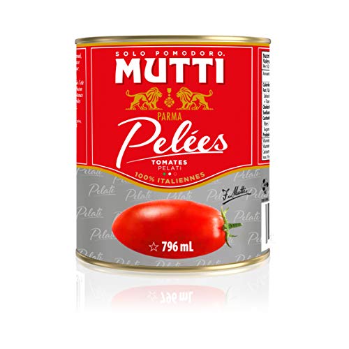 Mutti tomatoes cans on shelf suggesting versatile pantry staple for cooking