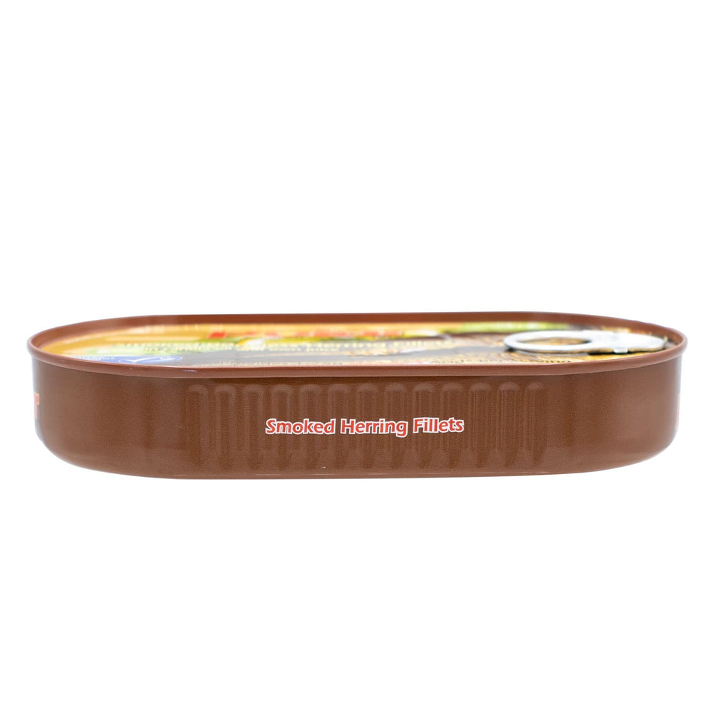MW Polar smoked herring being poured from oil into serving bowl