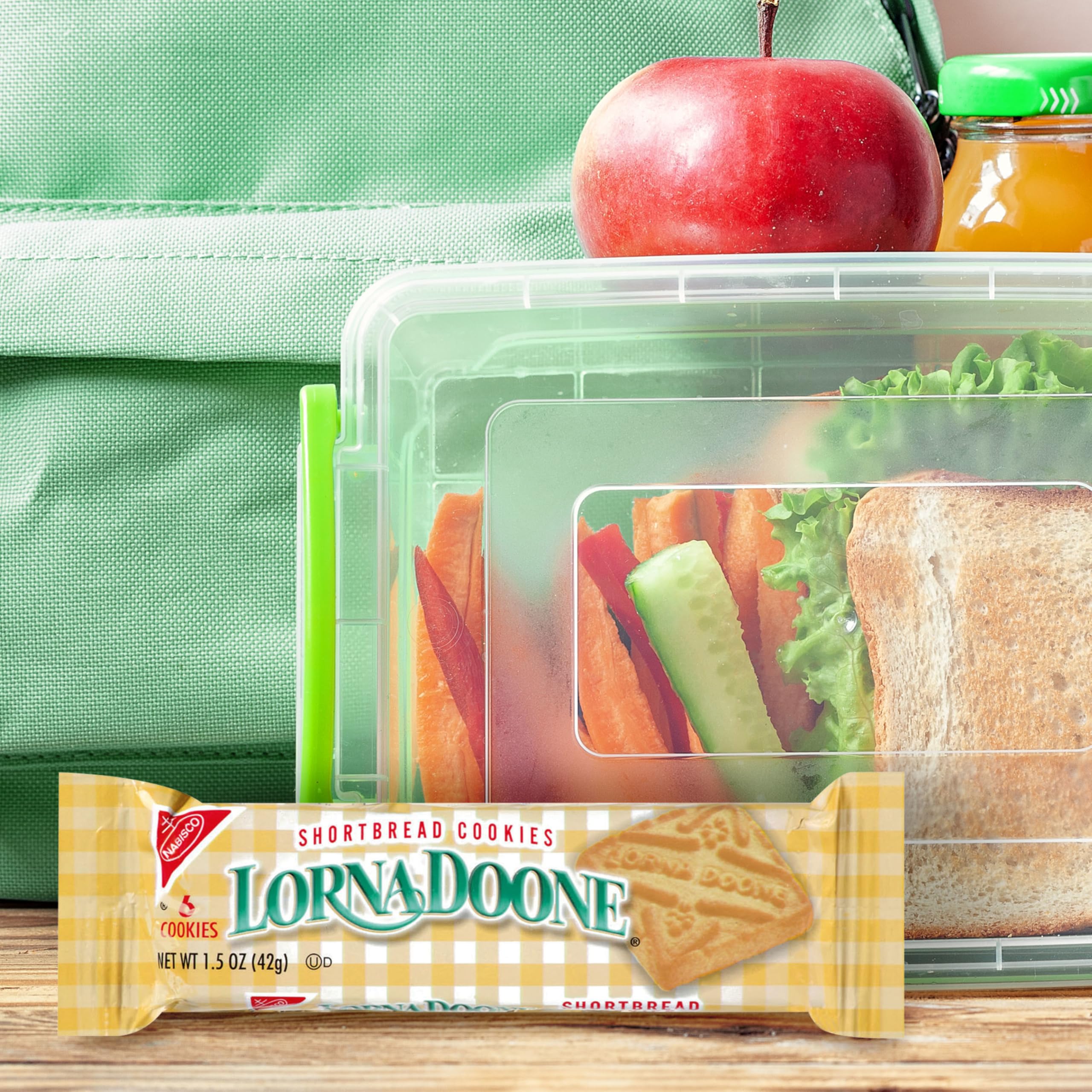 Dipping Nabisco Lorna Doone cookies in milk or tea.