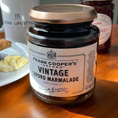 Nakato Frank Coopers Marmalade being spread on warm bread for aroma