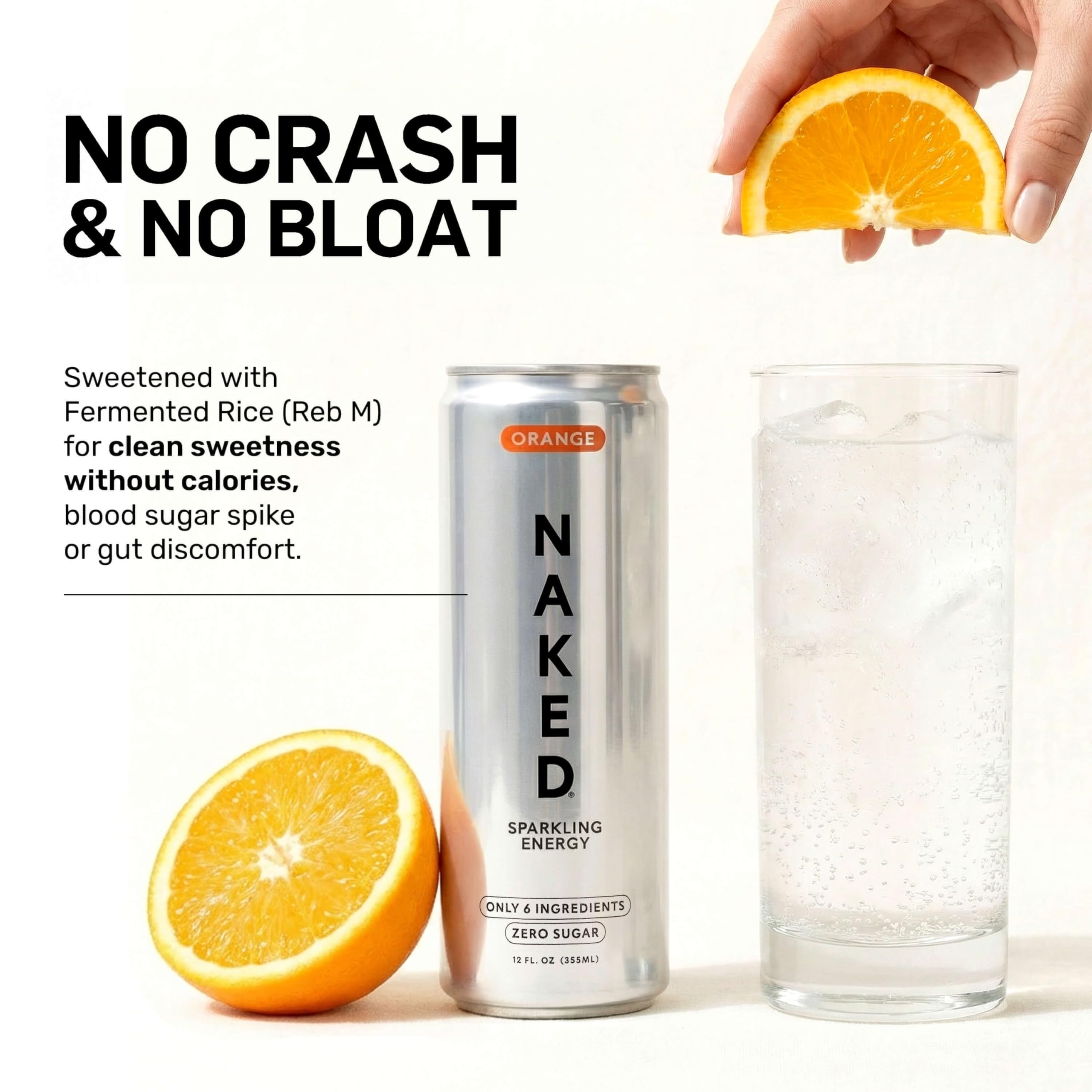 NAKED Sparkling Energy orange can poured into a glass for a quick lift