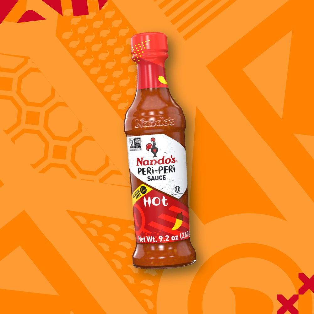 Nando's PERi-PERi wings glazed with sauce for spicy heat