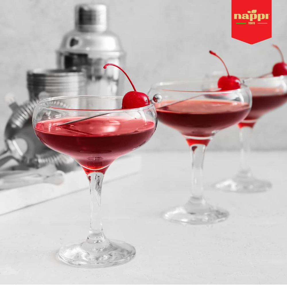Italian-made Nappi 1911 cherries beside dessert, hinting festive pairings and versatility.