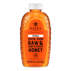 Nate's Honey Georgia bottle pour showing smooth drizzle and purity