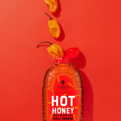 Nate's Hot Honey on a pizza cake with a tangy heat kick.