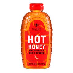 Nate's Hot Honey bottle pours a spicy-sweet drizzle for pizza.