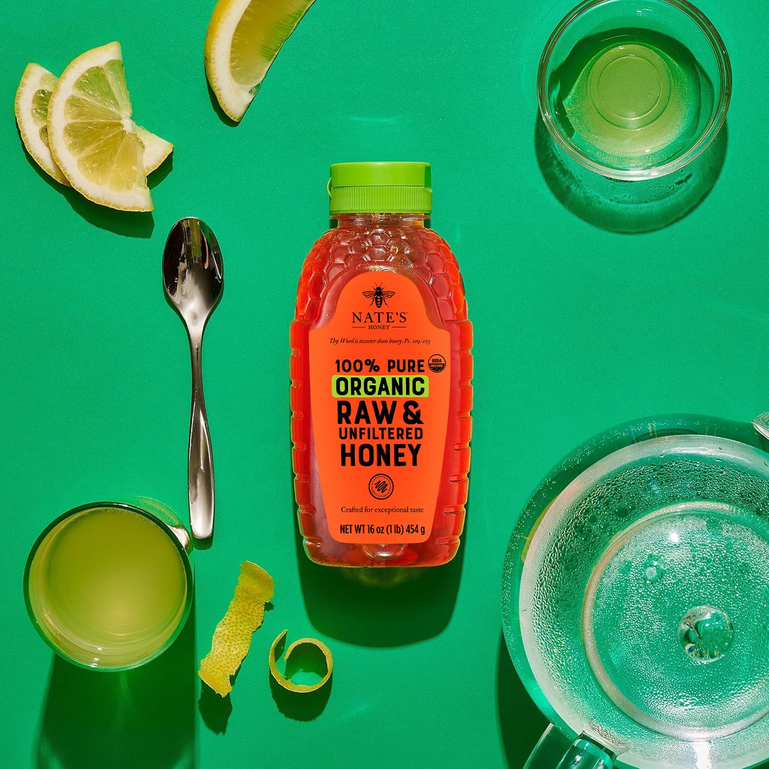 Nature Nate's honey on a tea spoon offers versatile drizzles and flavor enhancement.