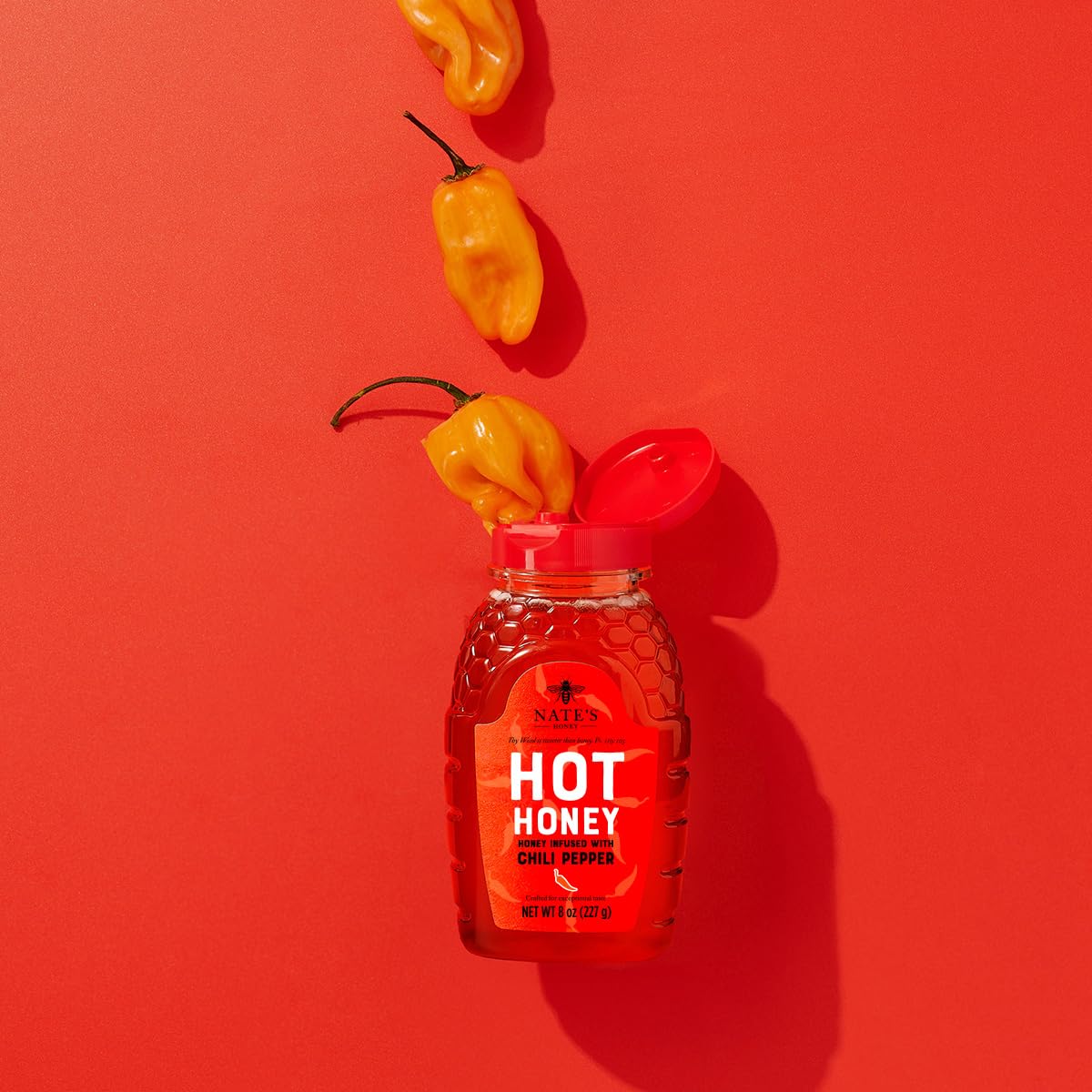 Nate's Hot Honey bottle closeup shows sweet heat and purity.