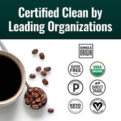 Natural Force dark roast beans in grinder, showcasing deep aroma and consistent grind