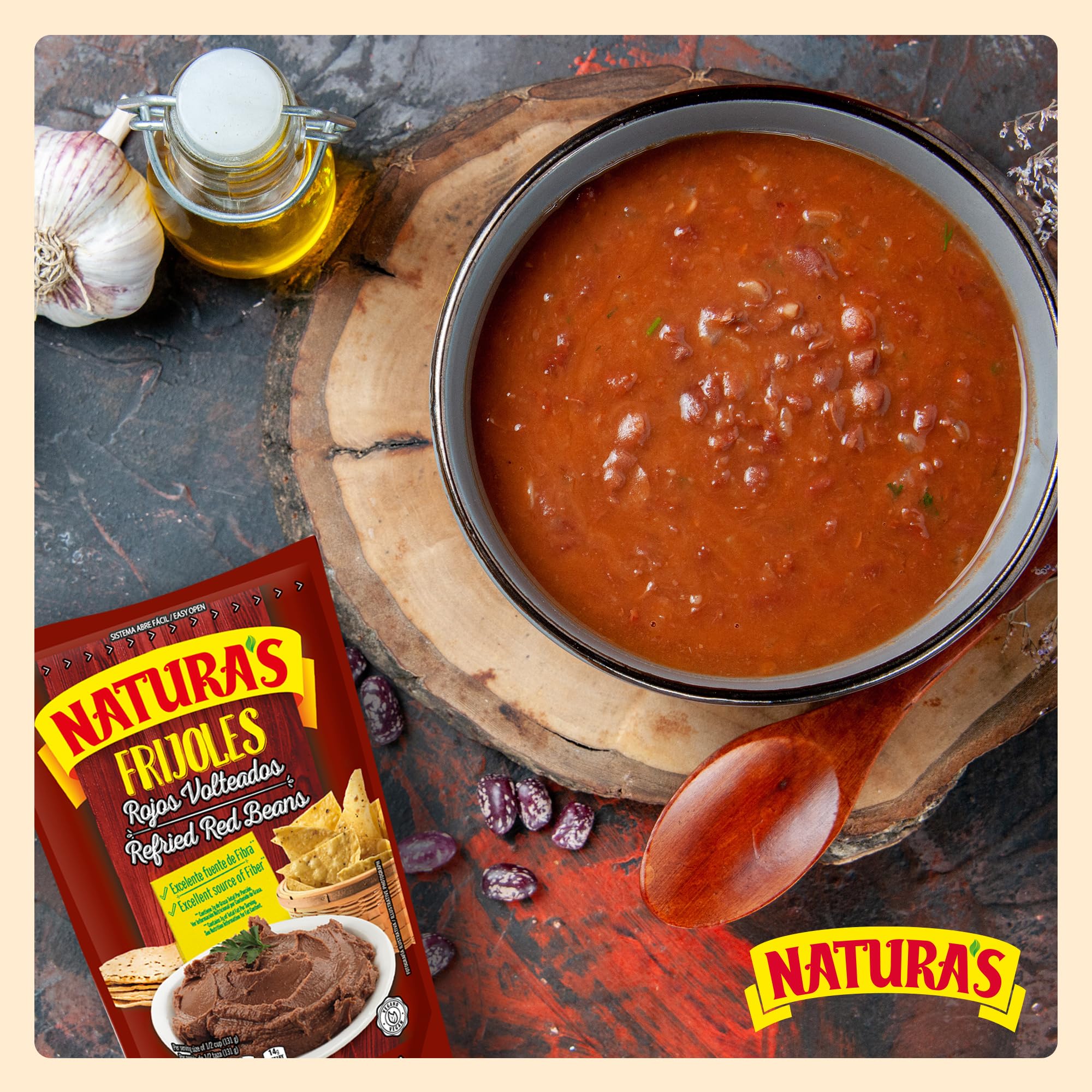 Natura's Refried Red Beans serving suggestion with tortillas and toppings.