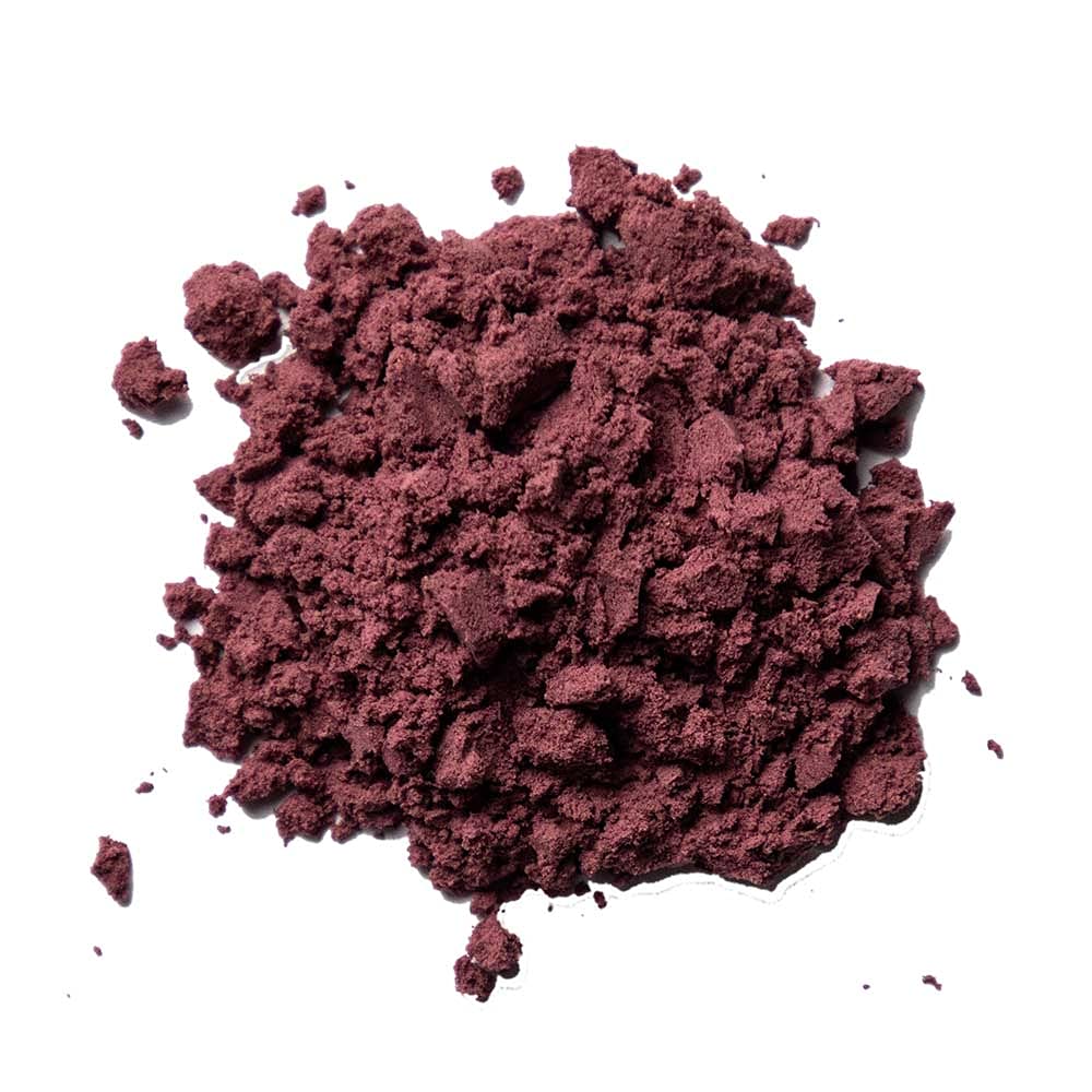 Nature Restore acai powder in smoothie bowl showcases nutritious supplement idea.