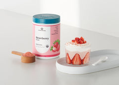 Nature Restore strawberry powder added to smoothies and yogurt for natural flavor.