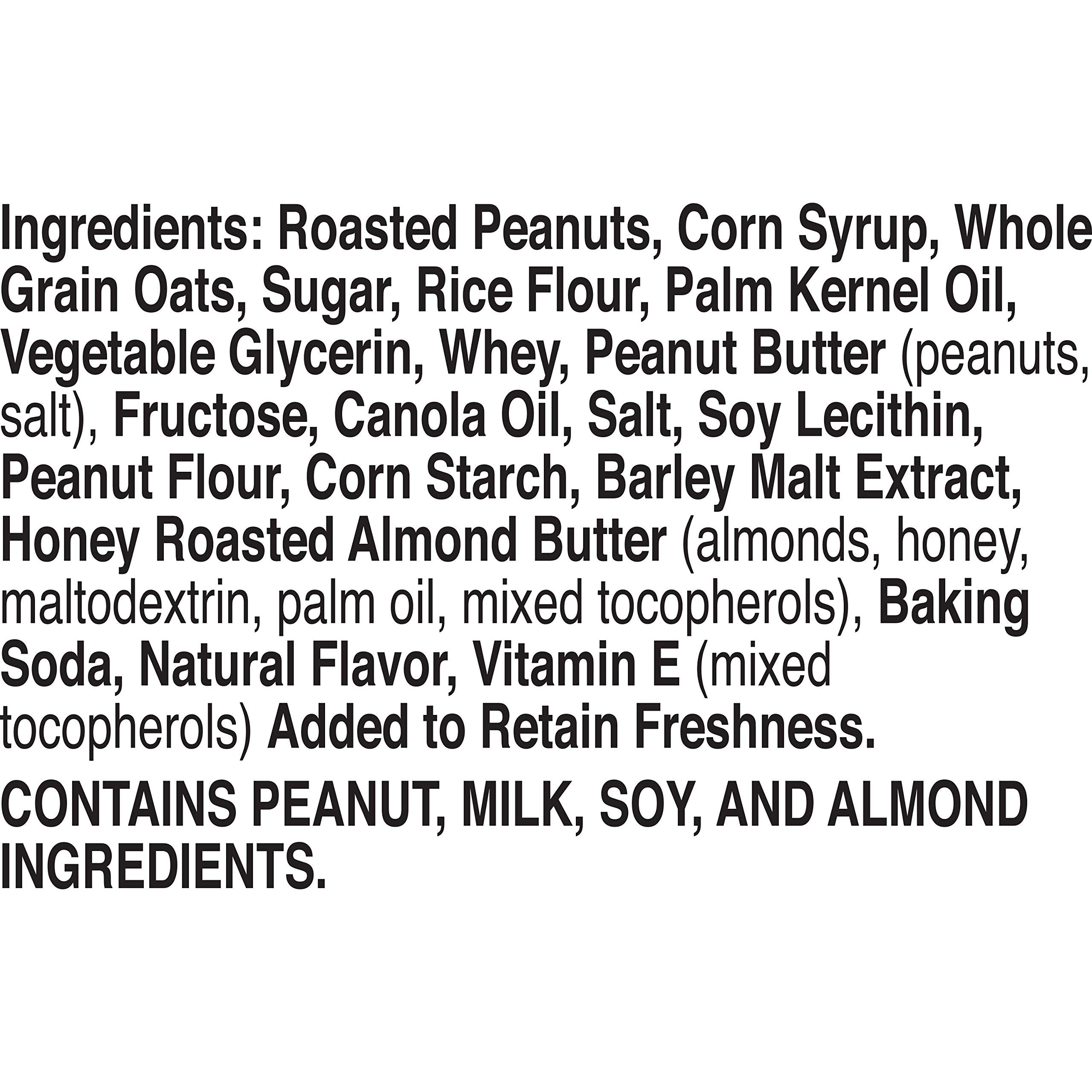 Close-up of Nature Valley granola bars dipped in peanut and almond butter for rich flavor.