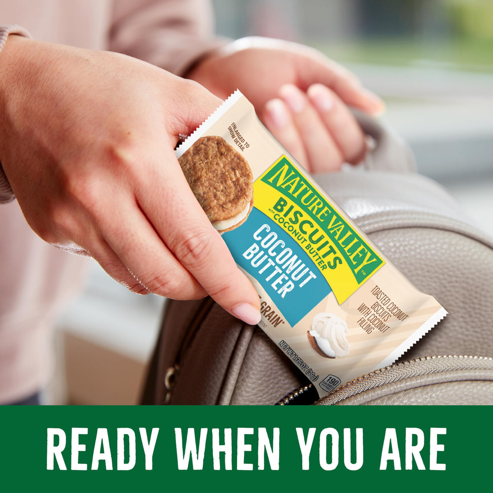 Nature Valley hiking snack during outdoor trail, compact pouch.