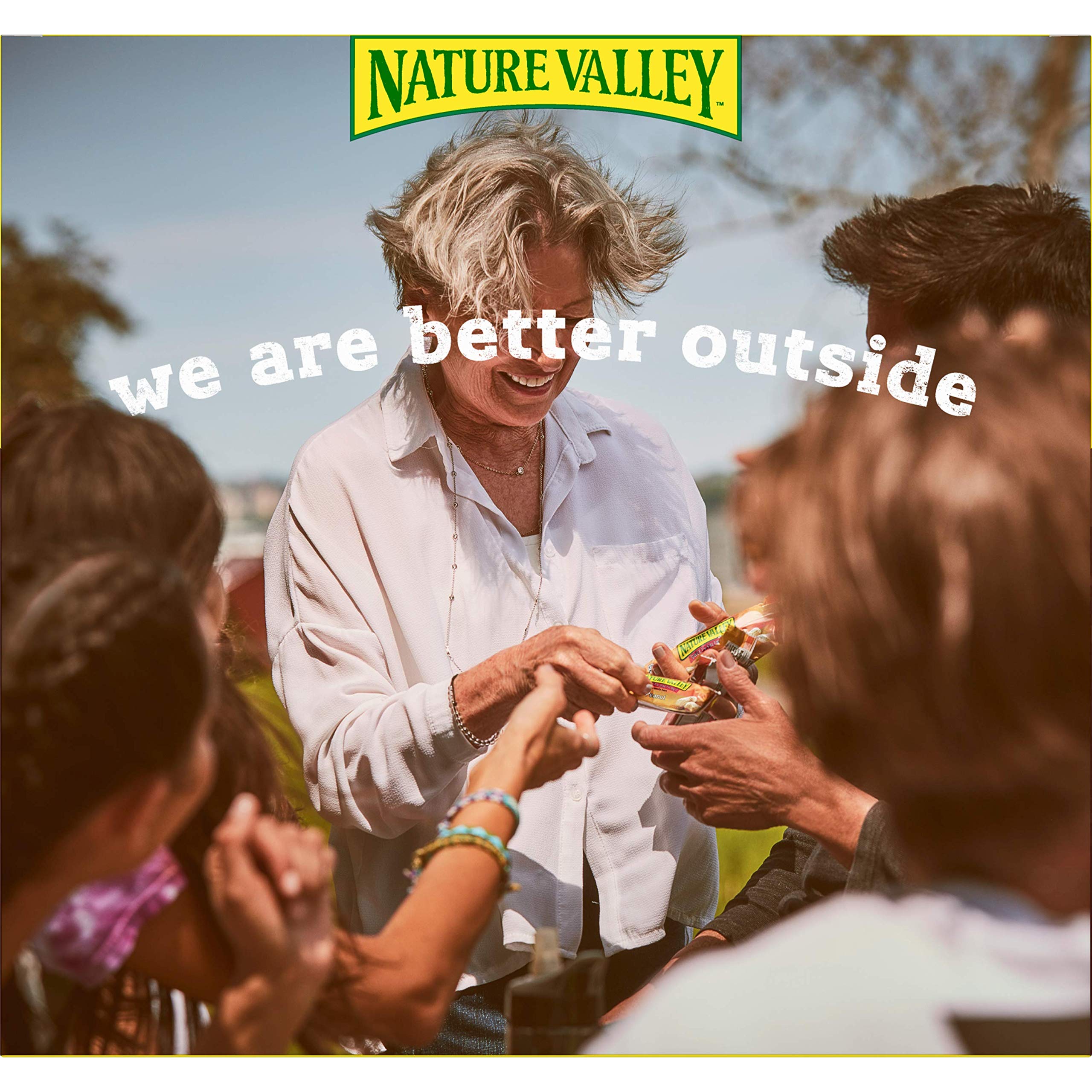 Nature Valley Roasted Mixed Nut bar on-the-go in outdoor adventures.