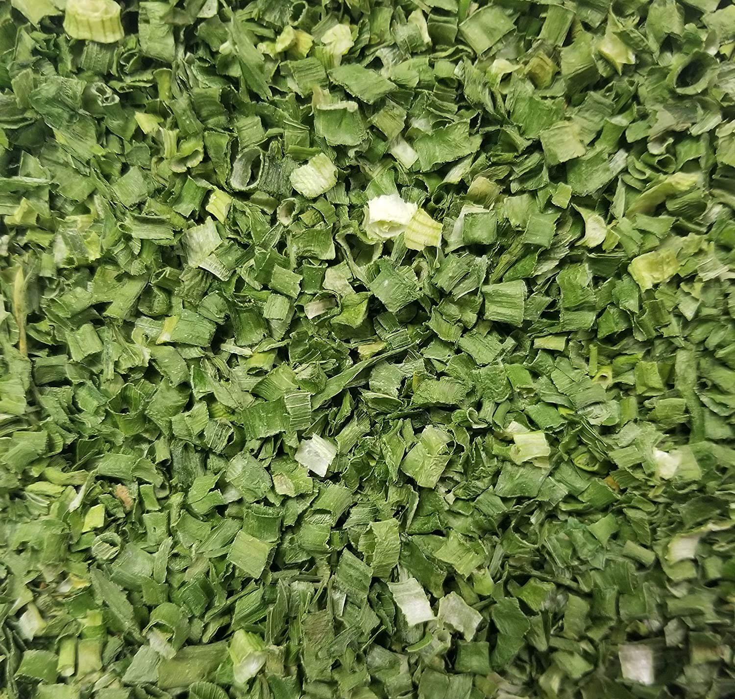 Naturejam freeze-dried chives sprinkled on a dish for instant flavor boost
