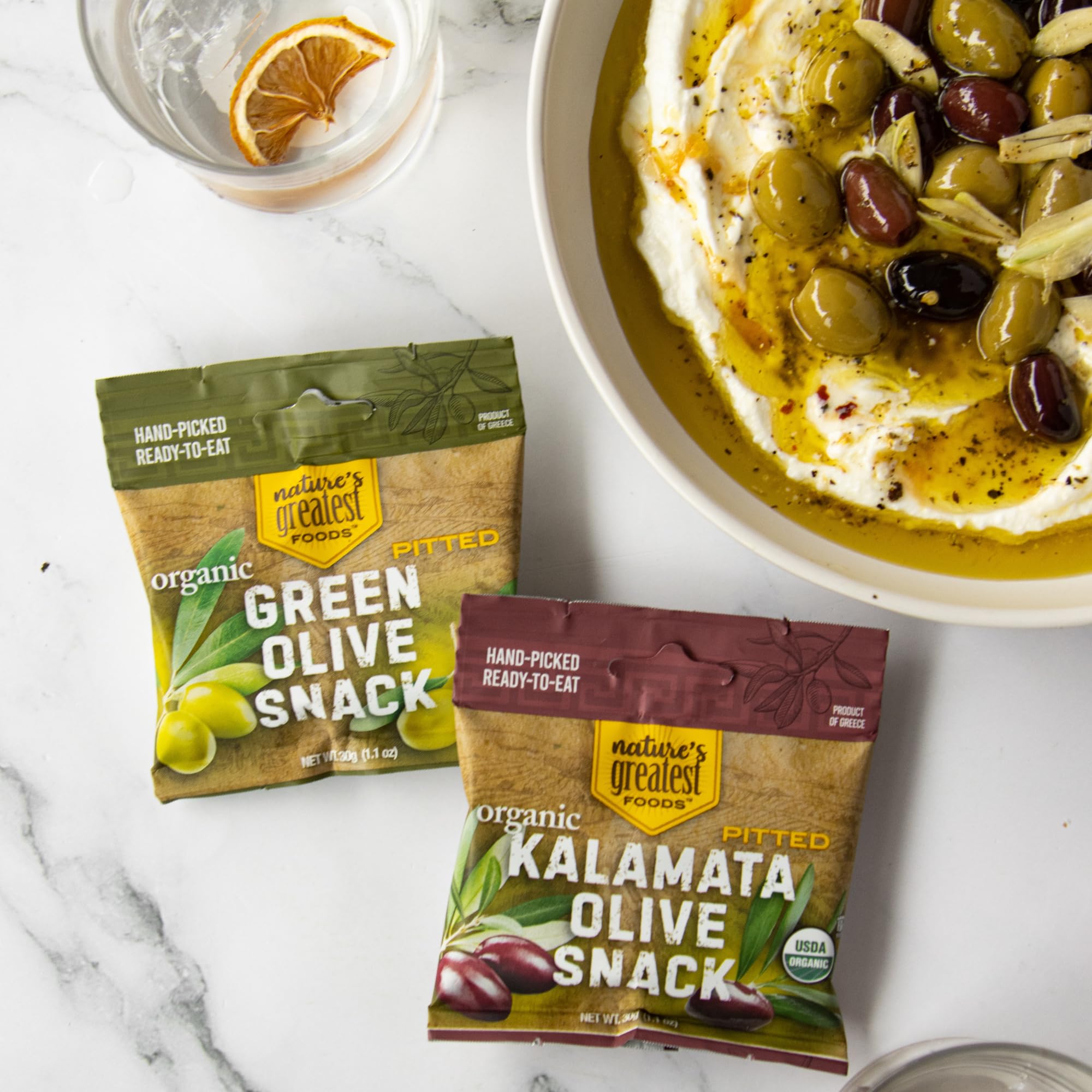 Nature's Greatest Foods green olive snack close-up, fresh and flavorful.