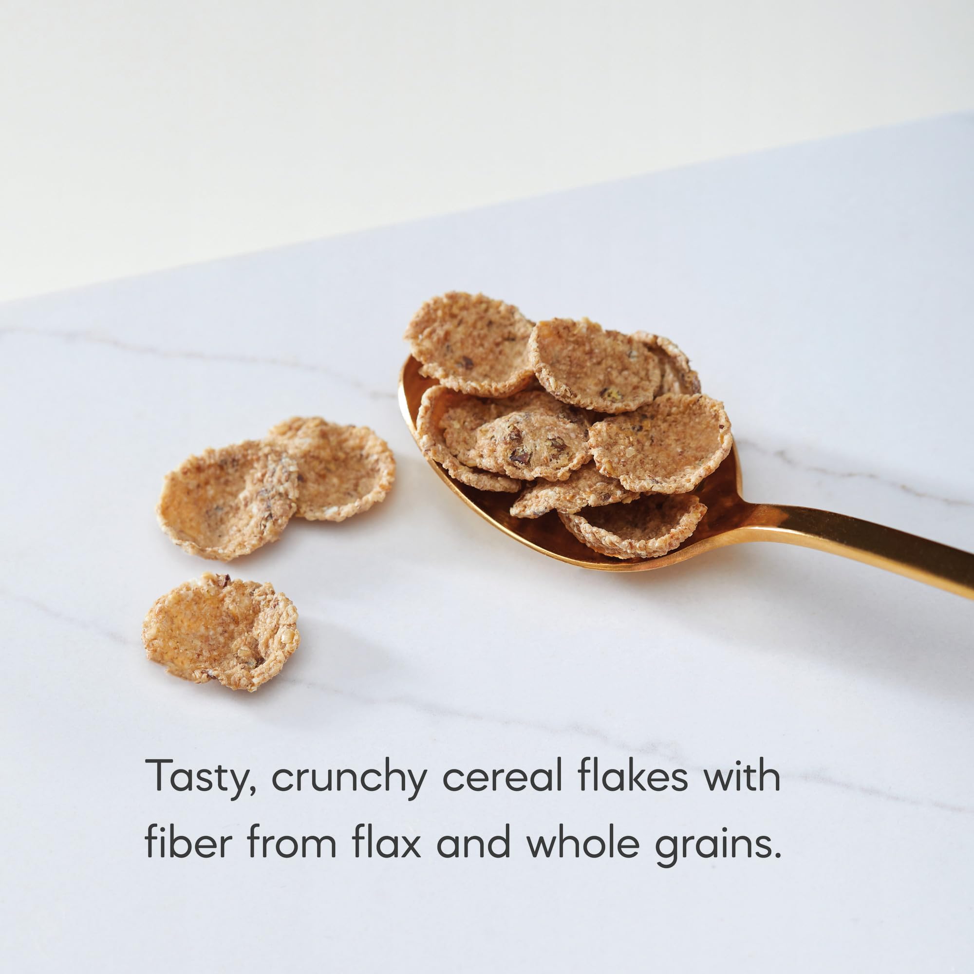 Milk pours over Nature's Path Flax Plus Multibran flakes for a crunchy texture.