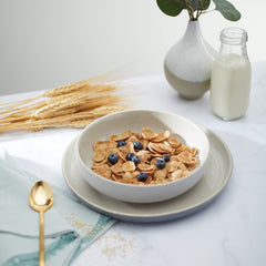 Heritage Flakes packaging highlighting organic and non-GMO ingredients.