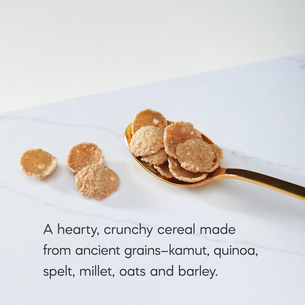 Nature's Path Heritage Flakes being poured into a bowl with milk.