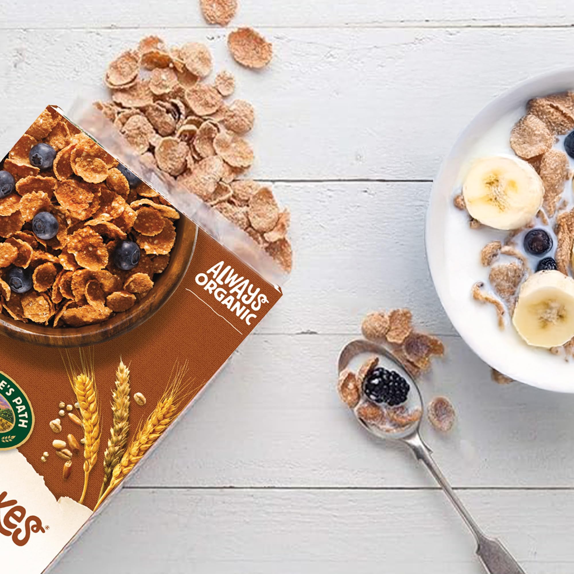 Nature's Path Heritage Flakes served with milk showing wholesome breakfast appeal.