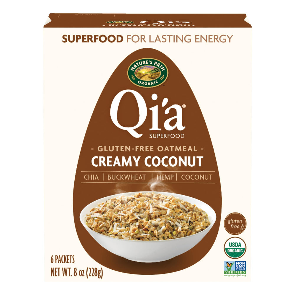 Nature's Path Qi'a Creamy Coconut Oatmeal box on shelf, ready for quick breakfasts.