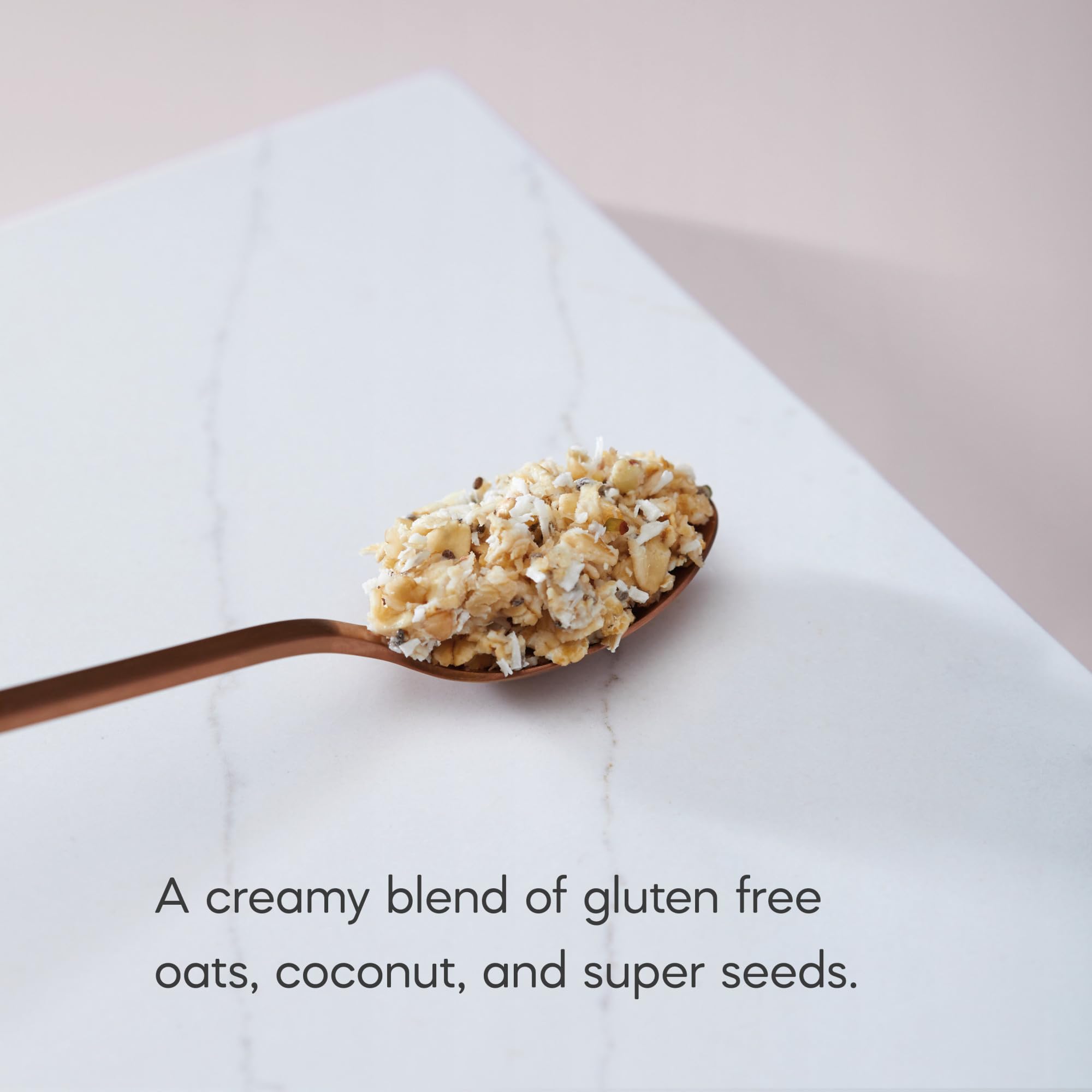 Prepared bowl of Nature's Path Qi'a Creamy Coconut Oatmeal with fruit topping.