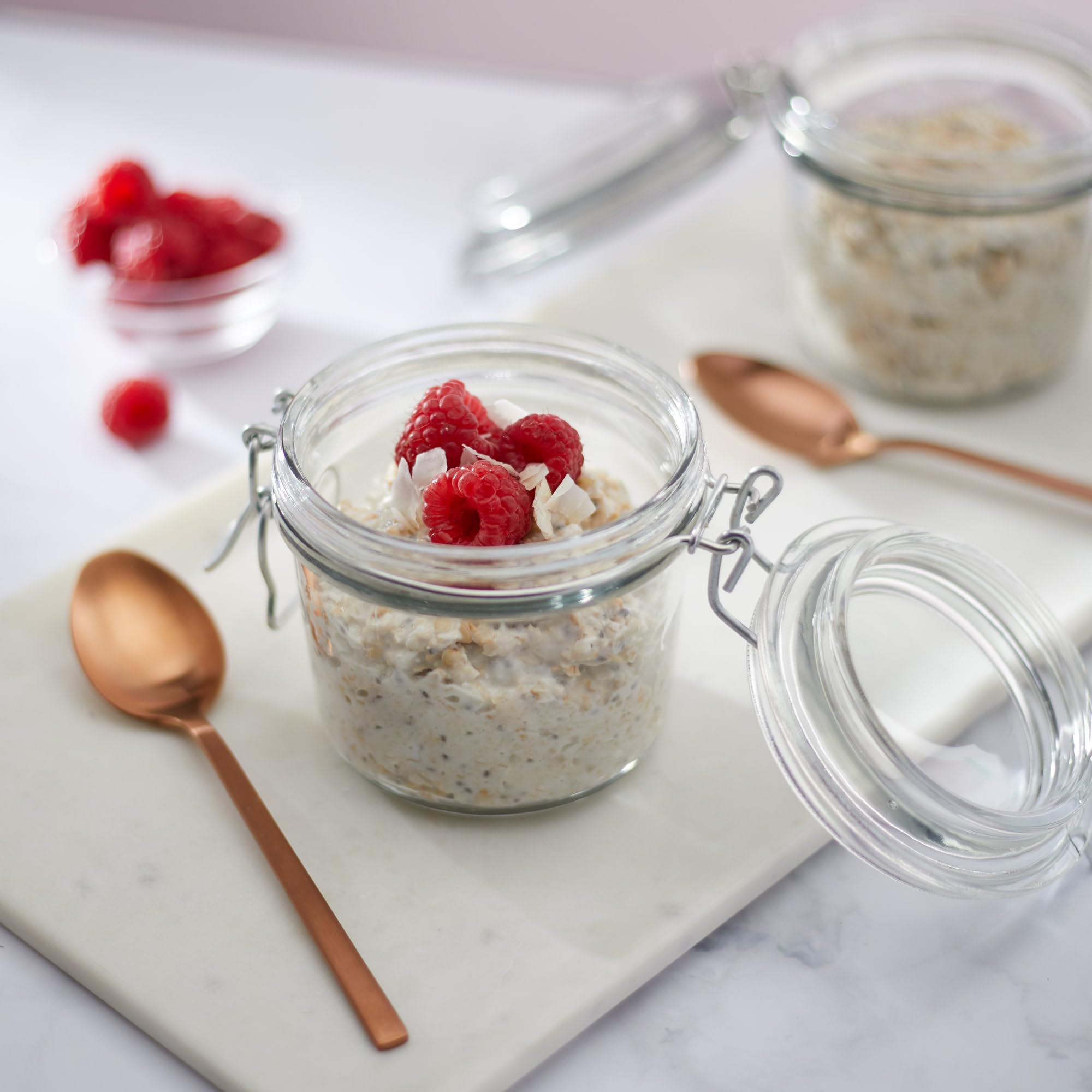 Gluten-free and Non-GMO label on Qi'a oats packaging.