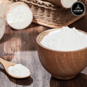 Naturevibe cassava flour pouring jar showing smooth texture for easy measuring.